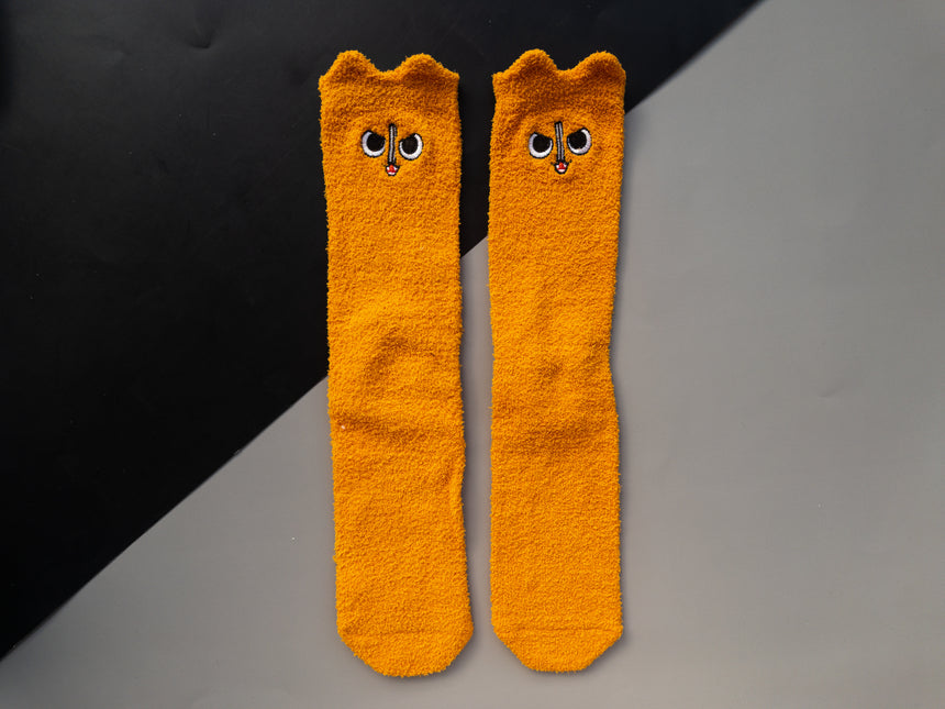 Angry Chainsaw Devil Fuzzy Socks