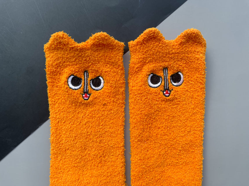 Angry Chainsaw Devil Fuzzy Socks